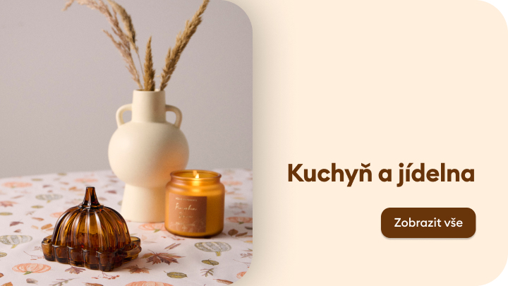 Dekorace do kuchyně a jídelny: elegantní váza, vonná svíčka a stylová dóza na stole s podzimním motivem. Objevte produkty pro útulné a stylové bydlení. Dole na obrázku je tlačítko „Zobrazit vše“, které vás přesměruje na kompletní nabídku. banner