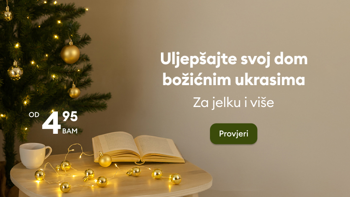 Porodična atmosfera uz božićnu jelku i poklone. Tekst pored: 