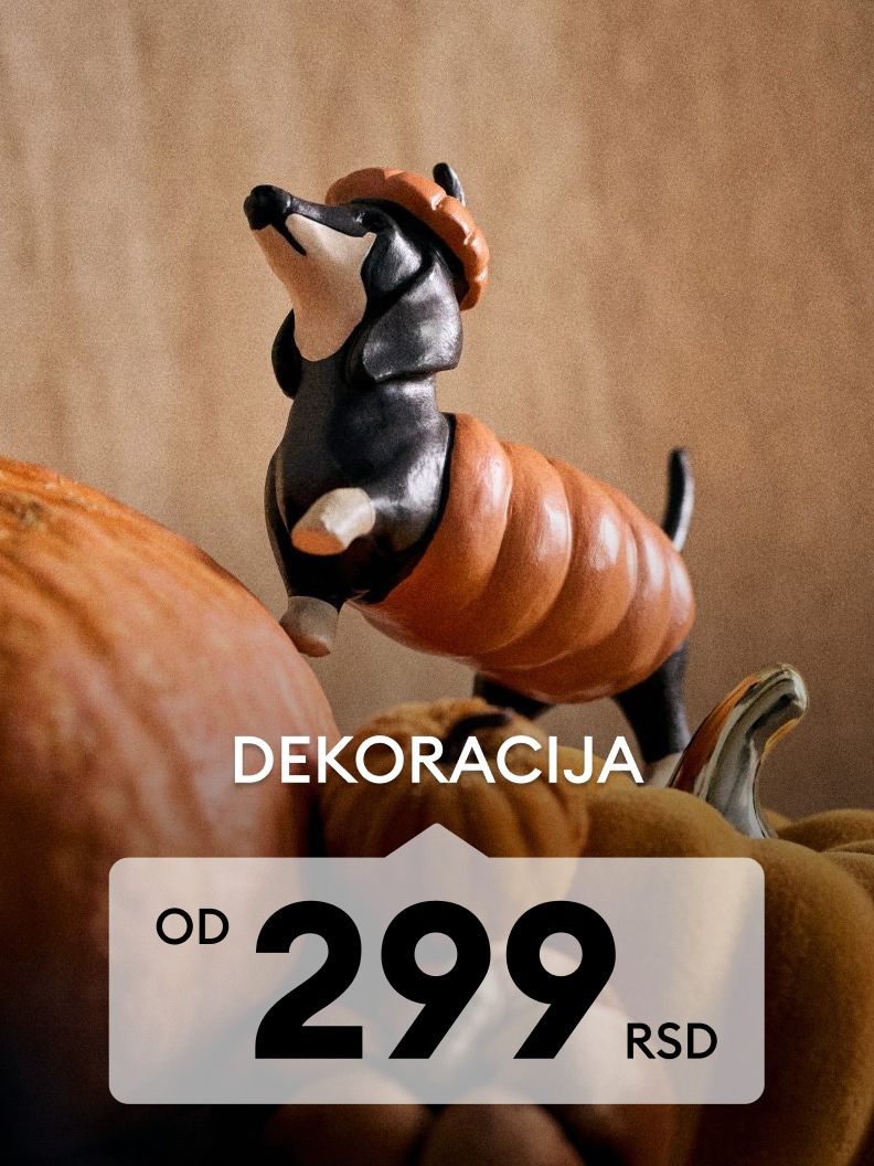 Jesenja dekoracija sa figurom jazavičara među bundevama, promotivna ponuda dekorativnih proizvoda od 299 RSD