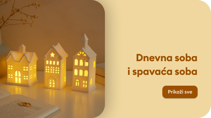 Dekorativni elementi za dnevnu i spavaću sobu. Tri osvetljene makete kuća na stolu stvaraju prijatan ambijent. Pored njih, otvorena knjiga i posuda sa suvim grančicama. Sa desne strane nalazi se natpis 