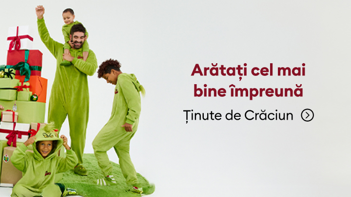 Persoane îmbrăcate în costume de Crăciun, stând lângă un teanc de cadouri colorate. Alături, textul: „Arătați cel mai bine împreună - Ținute de Crăciun”. Sărbătoriți Crăciunul în familie cu ținute tematice și cadouri inspirate. banner