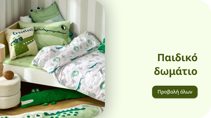 Παιδικό δωμάτιο με θέμα κροκόδειλους. Κρεβάτι διακοσμημένο με σεντόνια και μαξιλάρια με μοτίβα κροκόδειλου, παιχνίδια και χαλί σε σχήμα κροκόδειλου. Δημιουργικό και χαρούμενο περιβάλλον, ιδανικό για παιδιά.