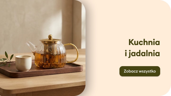 Akcesoria do kuchni i jadalni, w tym szklany dzbanek do herbaty i filiżanka, zachęcające do wyposażenia wnętrza i serwowania napojów