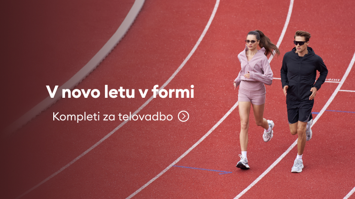 Na sliki sta dve osebi, ki tečeta po tekaški stezi. Besedilo poziva k ohranjanju telesne pripravljenosti v novem letu. Sporoča, da so na voljo kompleti za telovadbo in vključuje ikono za več informacij.