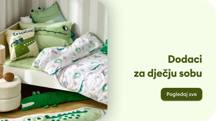 Dodaci za dječju sobu s motivima krokodila, uključujući posteljinu, jastuke i dekoracije. Prikladno za ugodno i zabavno uređenje dječjih prostora. Pored slike nalazi se tekst s pozivom na pregled svih proizvoda.