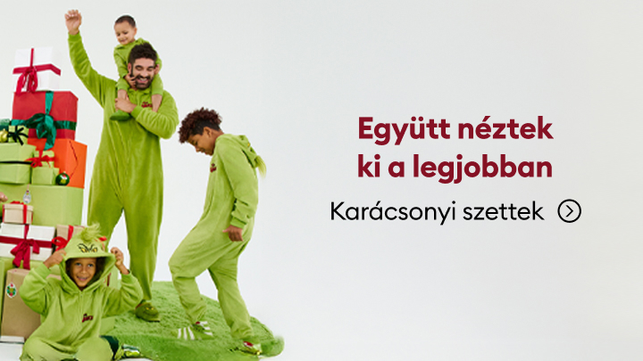 Karácsonyi hangulatú szettben pózoló csoport, vidám jelenet mellett ajándékokkal díszített karácsonyi háttér. Felirat szerepel: 